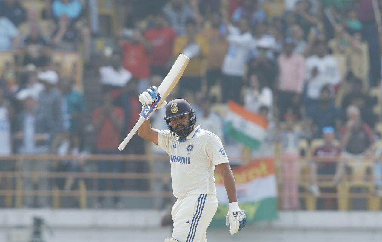 Rohit Sharma raises his bat after scoring a hundred, India vs England, 3rd Test, Rajkot, 1st day, February 15, 2024