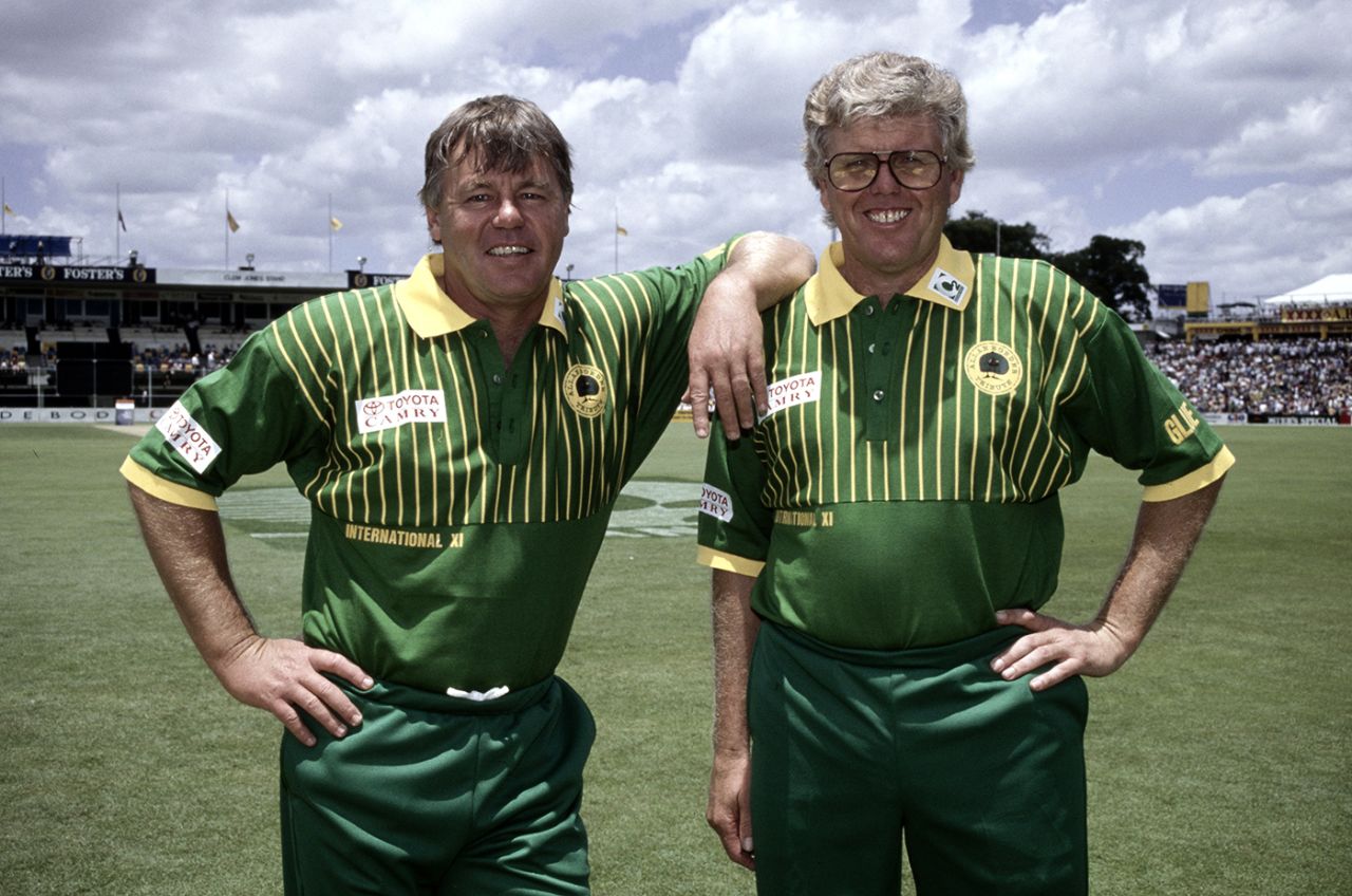 Mike Procter and Barry Richards pose for photos while playing for an International XI in a friendly match in Brisbane, January 12, 1993