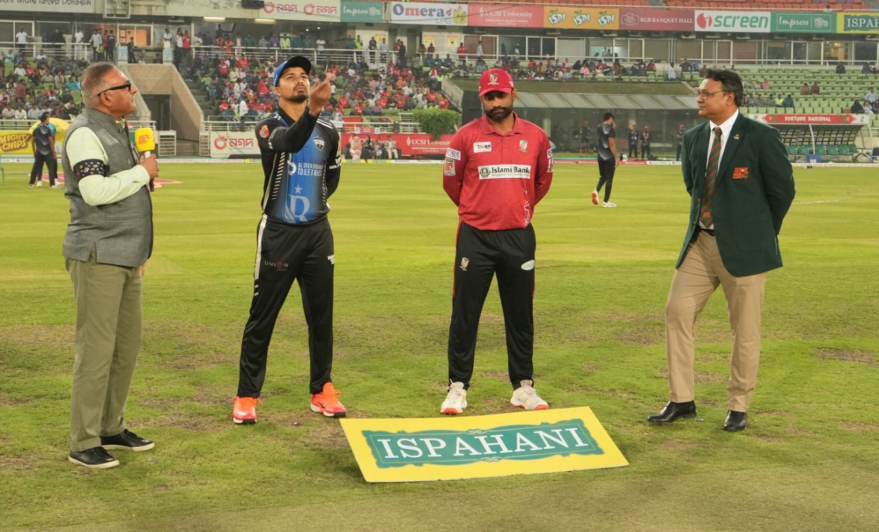 Nurul Hasan spins the coin as Tamim Iqbal watches, Rangpur Riders vs Fortune Barishal, Qualifier 2, BPL 2024, Mirpur, February 28, 2024