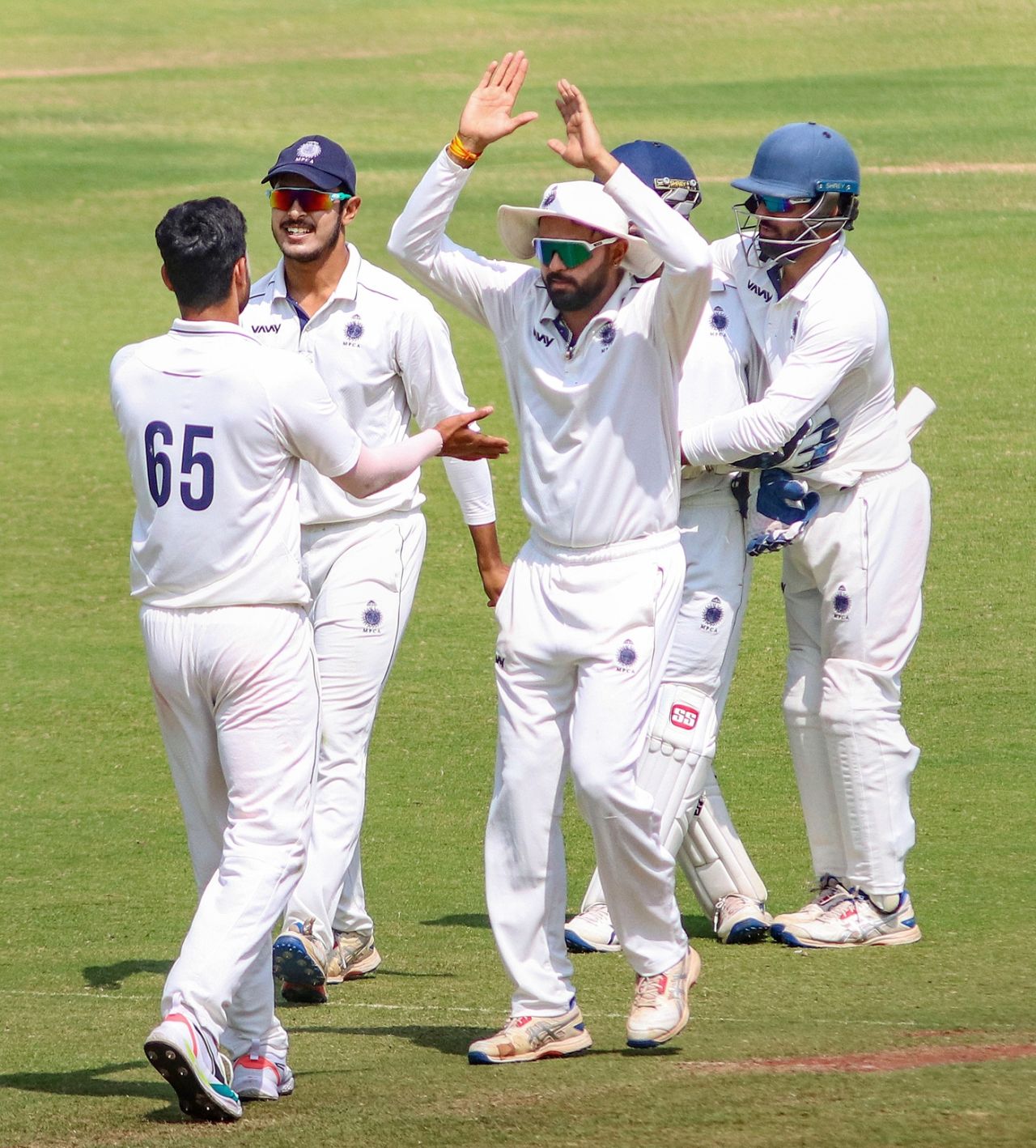 Kumar Kartikeya is mobbed by his team-mates after getting rid of Aman Mokhade, Vidarbha vs Madhya Pradesh, Ranji Trophy 2023-24, semi-final, third day, Nagpur, March 4, 2024