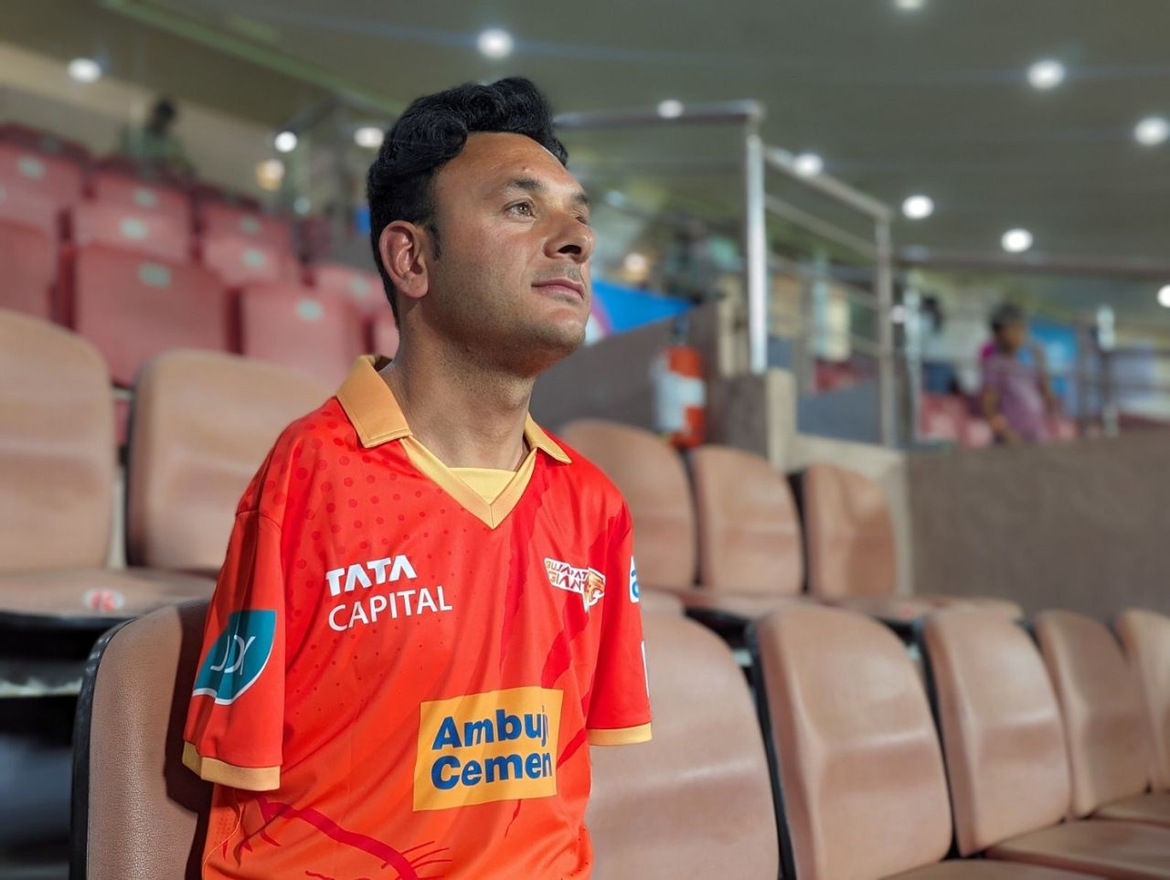 Amir Hussain Lone watches the Gujarat Giants-Delhi Capitals clash from the stands, Bengaluru, March 3, 2024