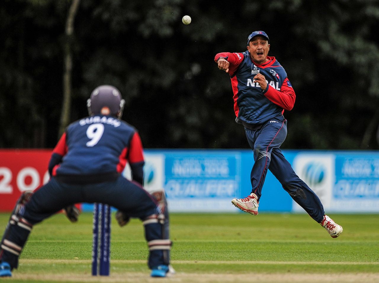 Paras Khadka throws the ball to the keeper, Hong Kong v Nepal, ICC World T20 Qualifier, Belfast, July 15, 2015