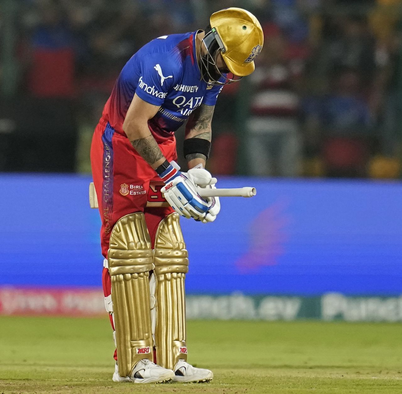 Virat Kohli celebrates his half-century by working on his bat grip, Royal Challengers Bengaluru vs Punjab Kings, IPL 2024, Bengaluru, March 25, 2024