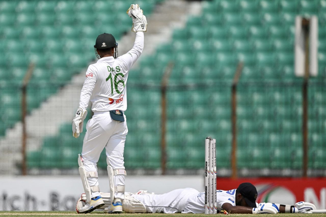 Nishan Madushka is floored - and run-out - after a mix-up with Dimuth Karunaratne, Bangladesh vs Sri Lanka, 2nd Test, Chattogram, Day 1, March 30, 2024 