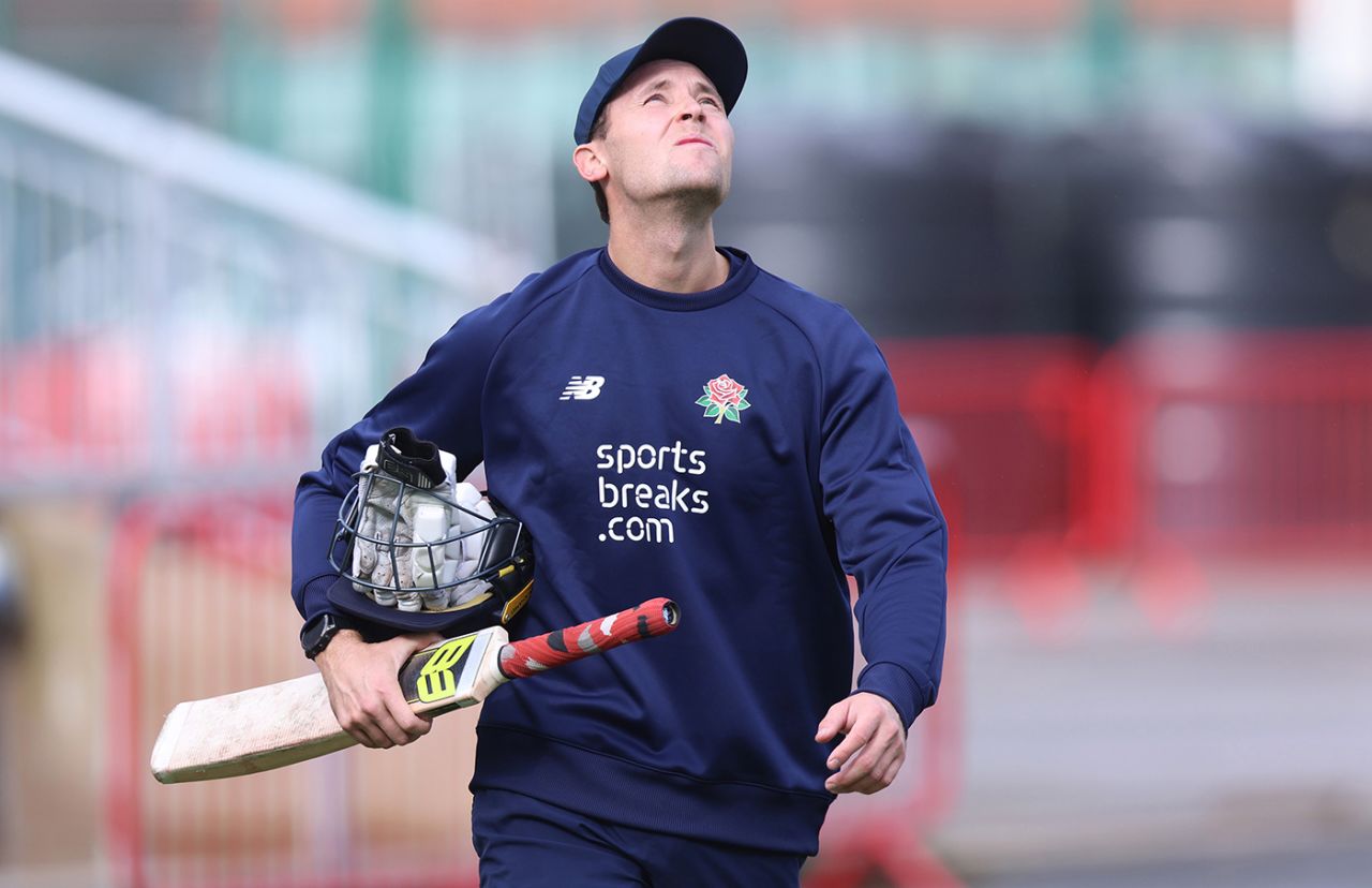 Look up now down: Tom Hartley hopes for a break in the weather, Lancashire vs Surrey, County Championship, Division One, Old Trafford, April 5, 2024