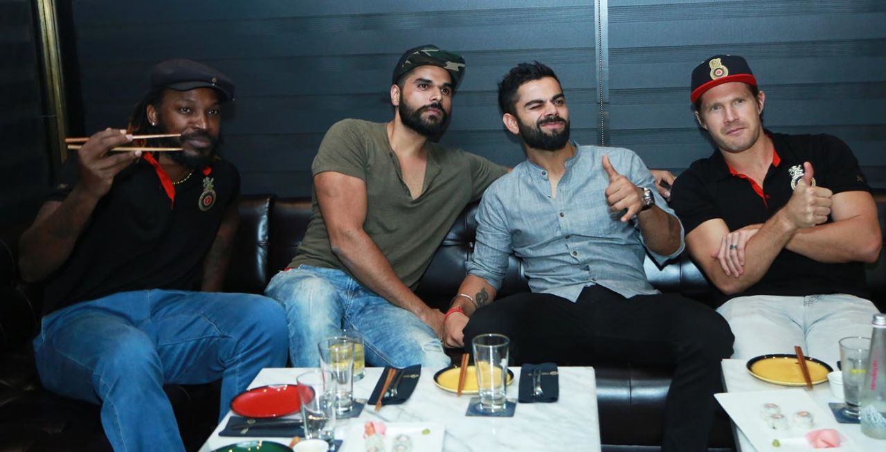 Chris Gayle, Virat Kohli and Shane Watson at a restaurant in New Delhi, May 12, 2017