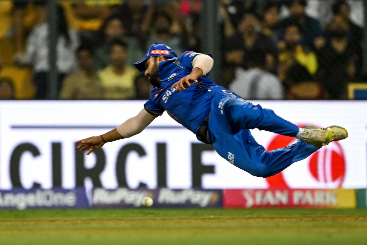 Rohit Sharma dives to try and take a catch on the boundary, Mumbai Indians vs Chennai Super Kings, IPL 2024, Mumbai, April 14, 2024