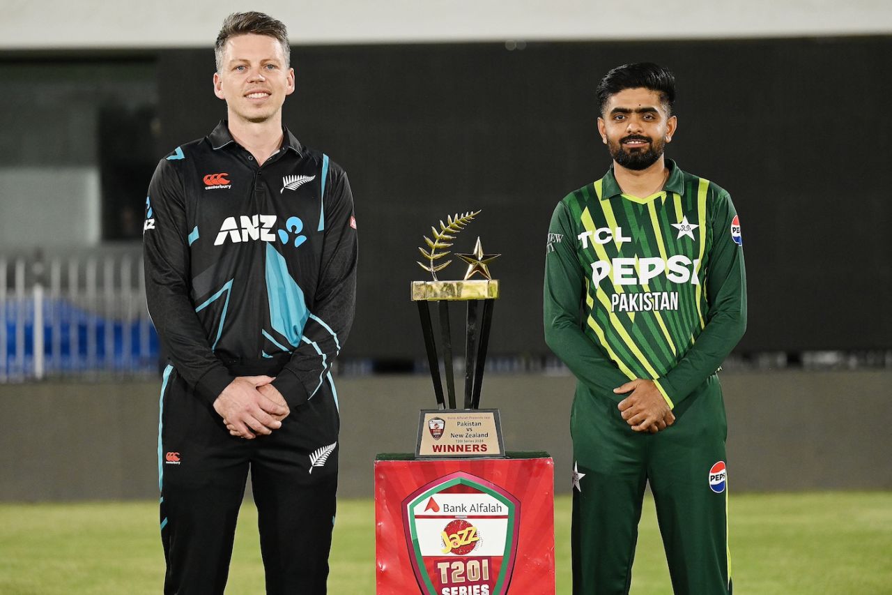 Michael Bracewell and Babar Azam with the T20I series trophy, Rawalpindi, April 17, 2024
