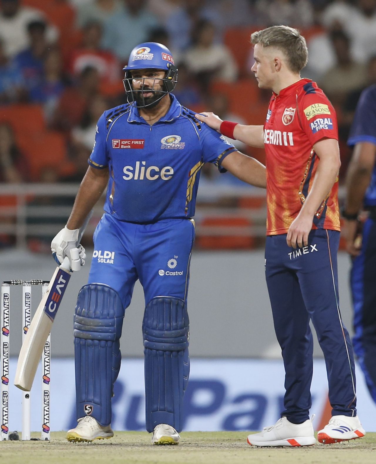 Sam Curran checks in on Rohit Sharma after hitting his helmet (off an attempted sweep), Punjab Kings vs Mumbai Indians, IPL 2024, Mullanpur, April 18, 2024