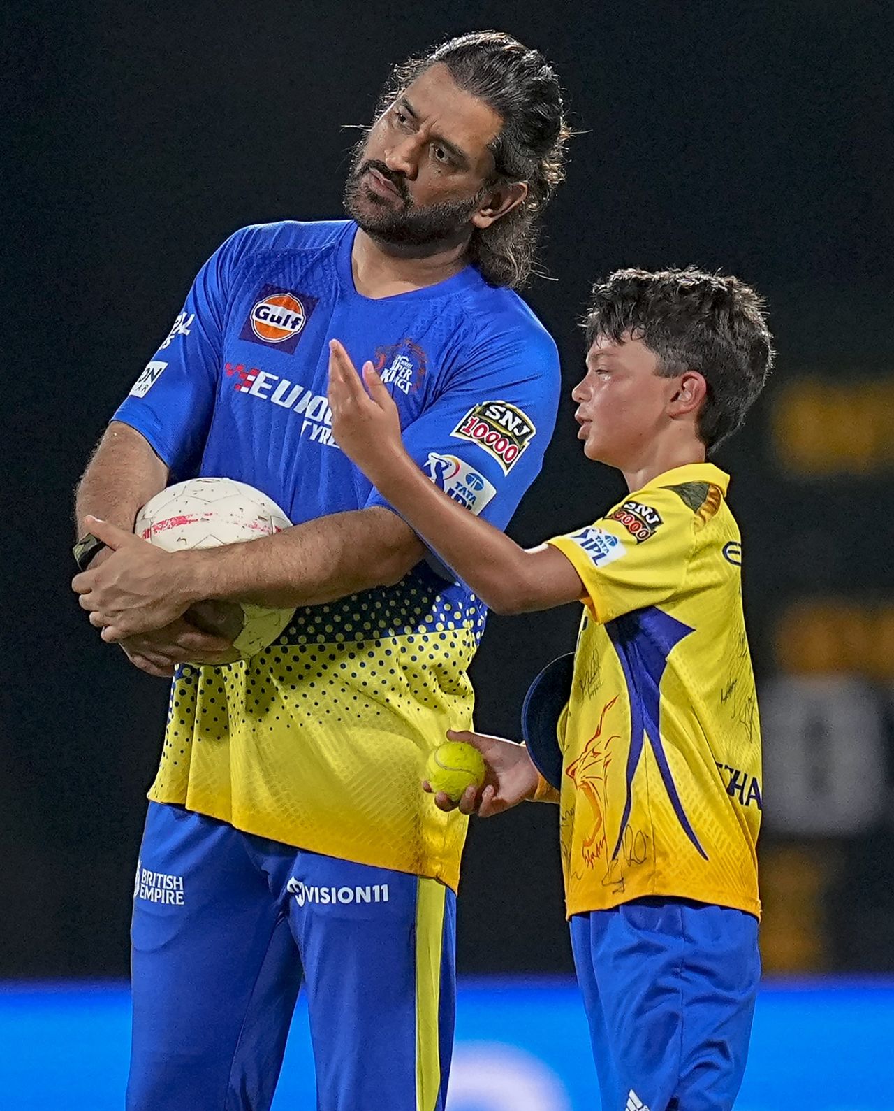 MS Dhoni with Ethan, the son of CSK trainer Greg King, Chennai, April 30, 2024