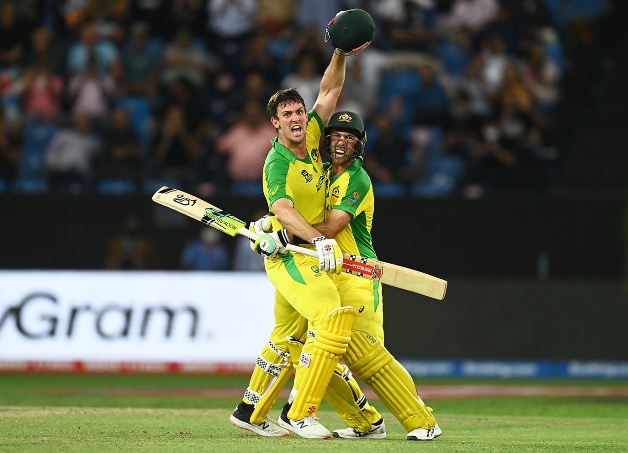 Glenn Maxwell and Mitchell Marsh go up in celebration after the winning runs, Australia vs New Zealand, T20 World Cup final, Dubai, November 14, 2021