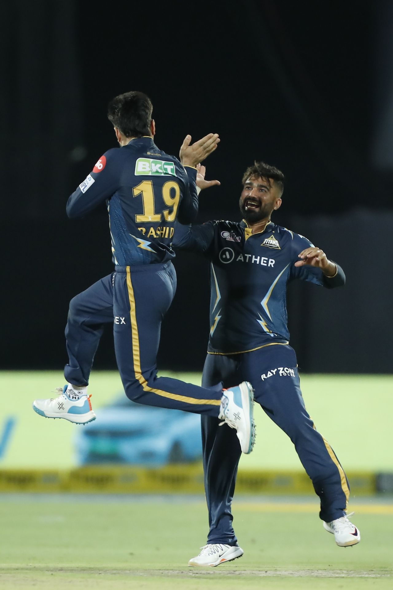 Rashid Khan and Rahul Tewatia celebrate the wicket of R Ashwin, Rajasthan Royals vs Gujarat Titans, IPL 2023, Jaipur, May 5, 2023