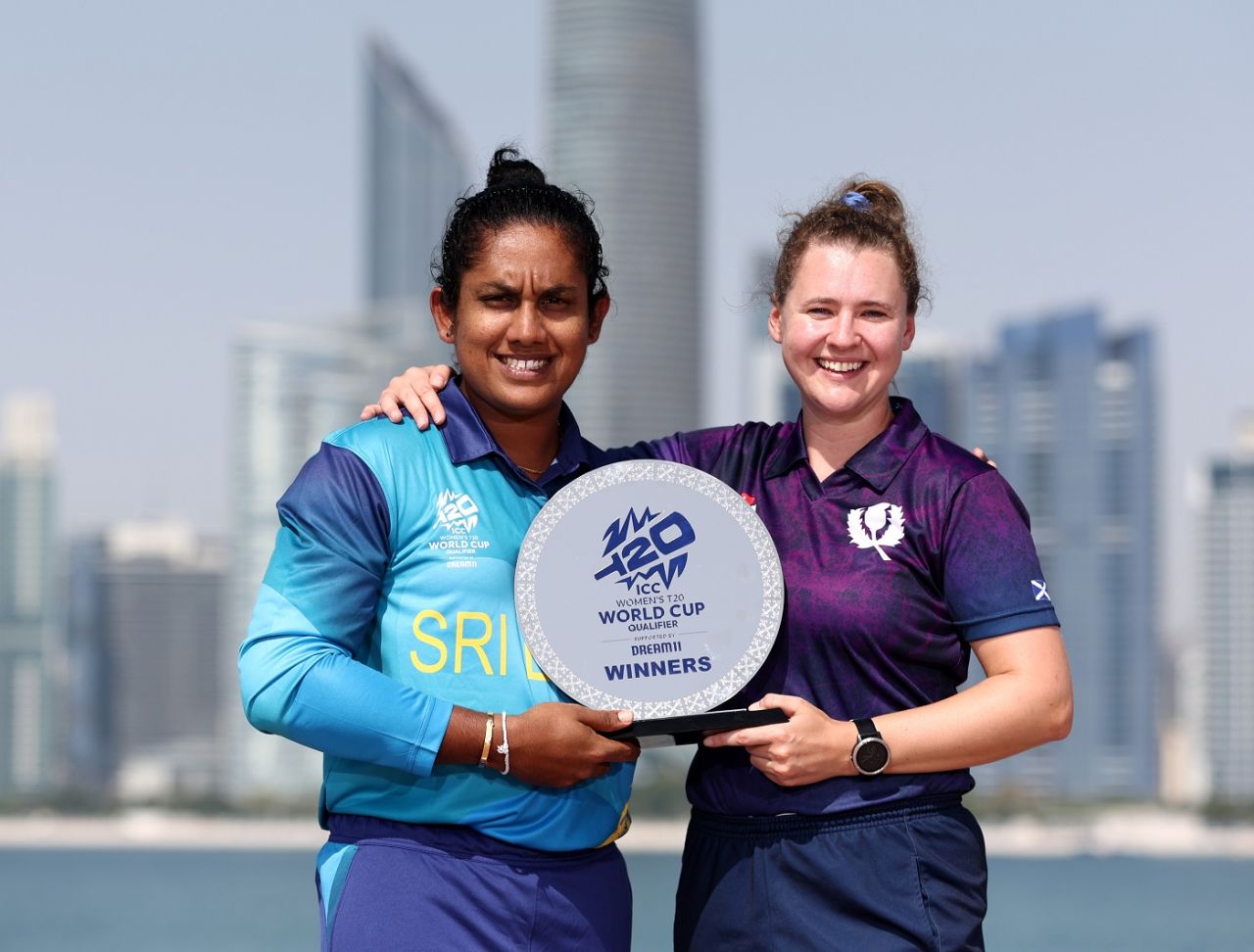 Chamari Athapaththu and Kathryn Bryce with the Women's T20 World Cup Qualifier trophy, Scotland vs Sri Lanka, Women's T20 World Cup Qualifier, final, Abu Dhabi, May 6, 2024