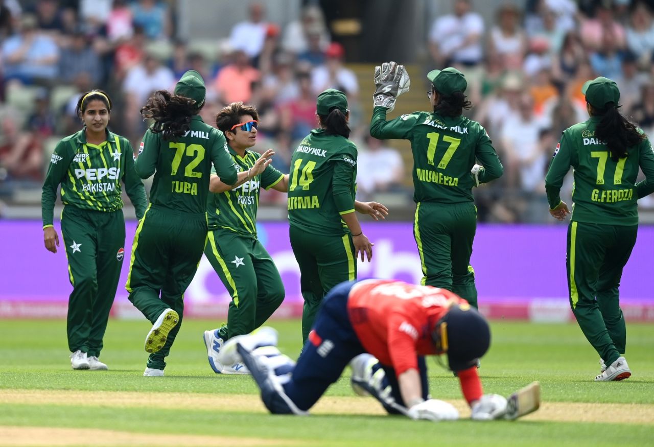 The Pakistan fielders celebrate after Freya Kemp is run out, England vs Pakistan, 1st women's T20I, Birmingham, May 11, 2024
