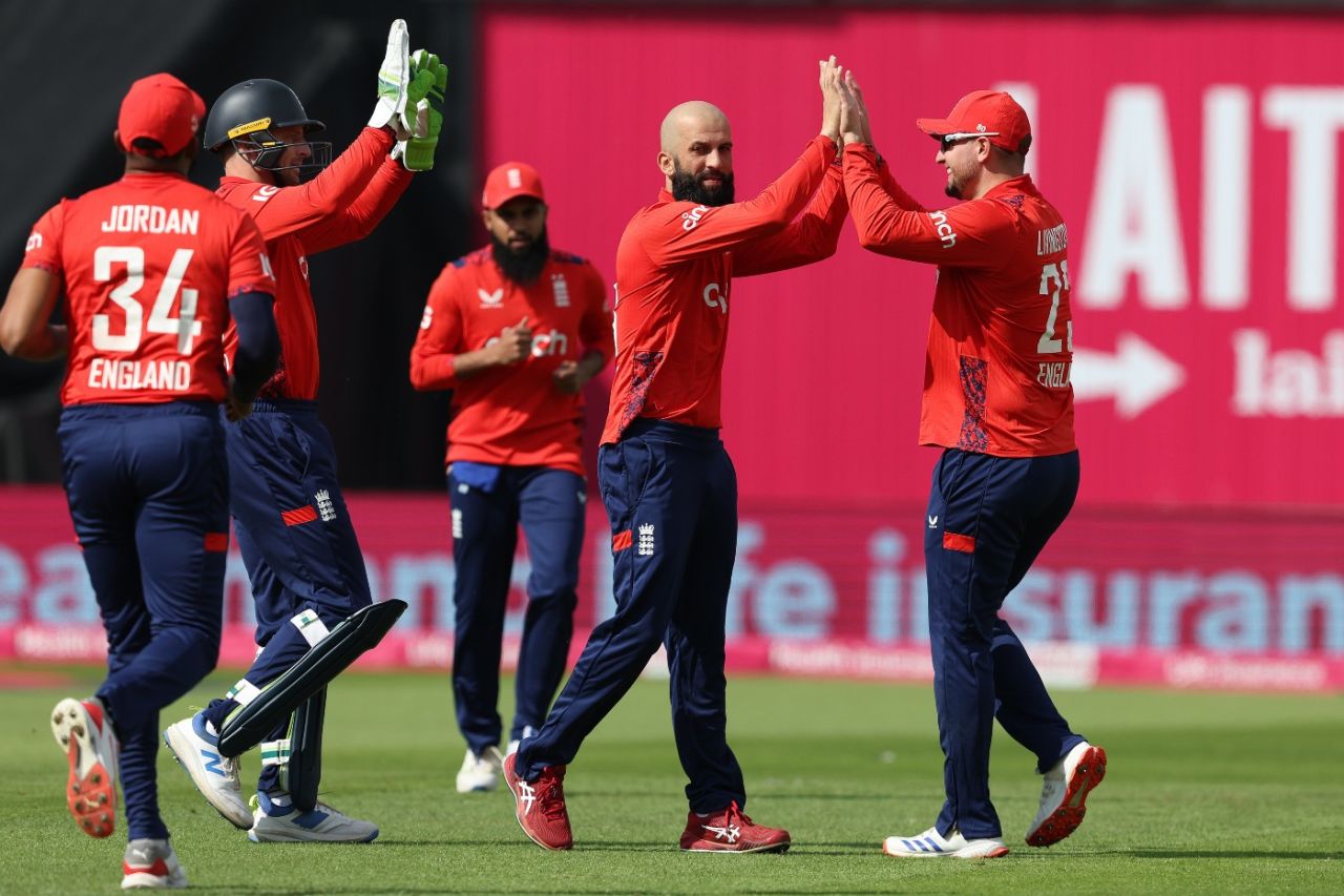 Moeen Ali celebrates removing Mohammad Rizwan for a three-ball duck in in the first over of Pakistan's chase