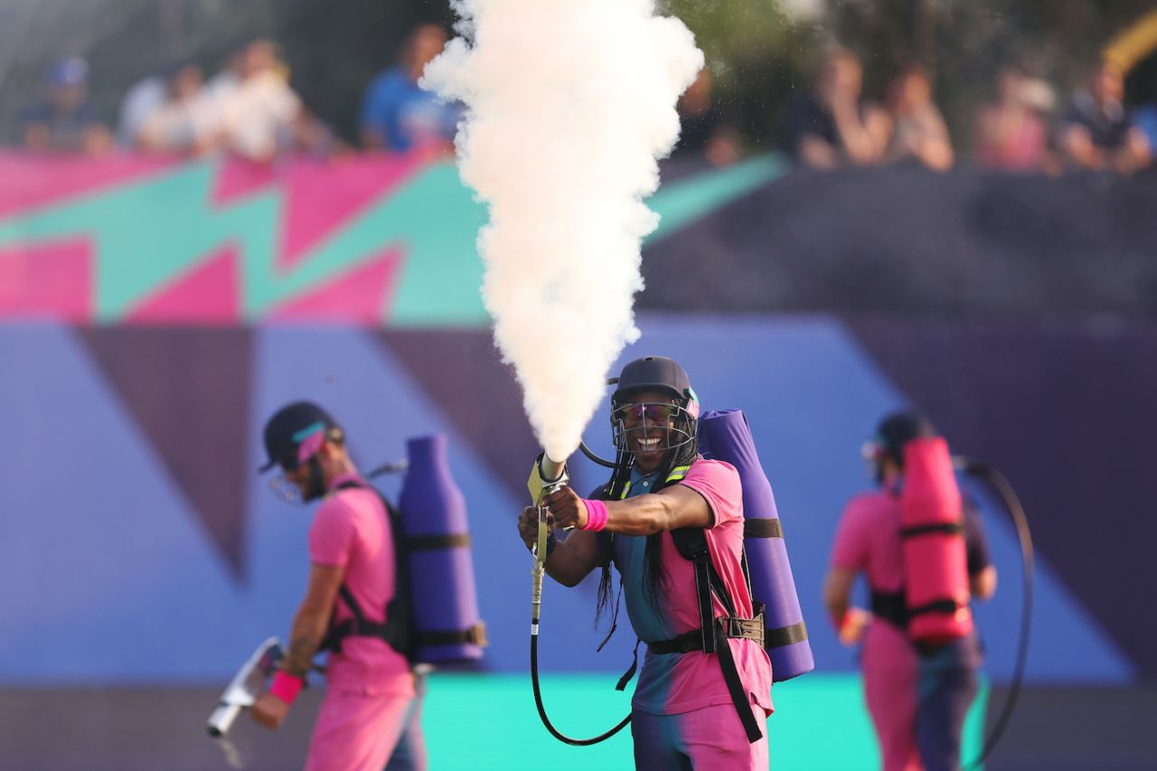 A performer uses a smoke gun during the opening ceremony of the T20 World Cup, USA vs Canada, T20 World Cup 2024, Group A, Dallas, June 1, 2024