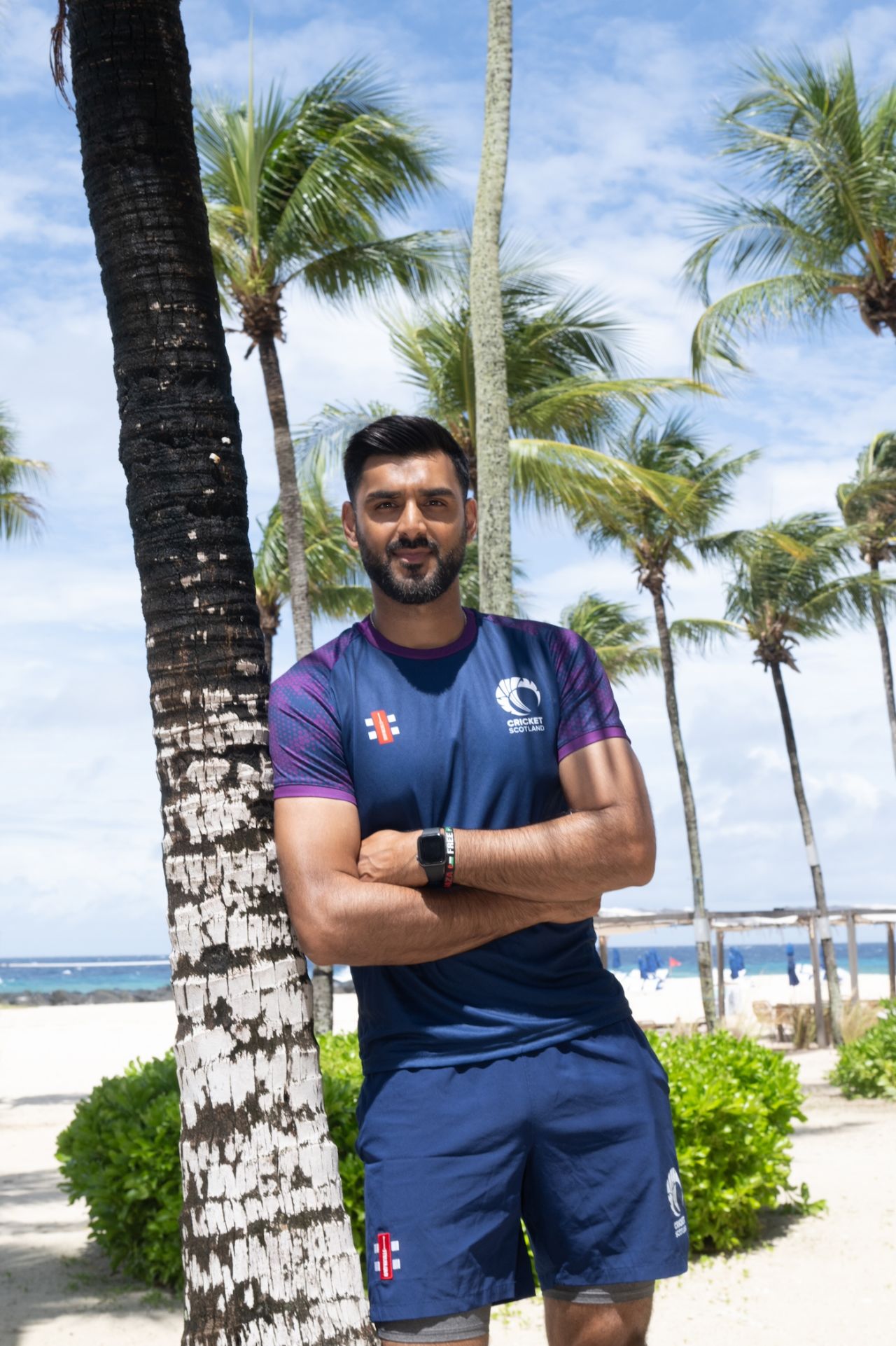Safyaan Sharif strikes a pose during a team photo session, Bridgetown, June 2, 2024