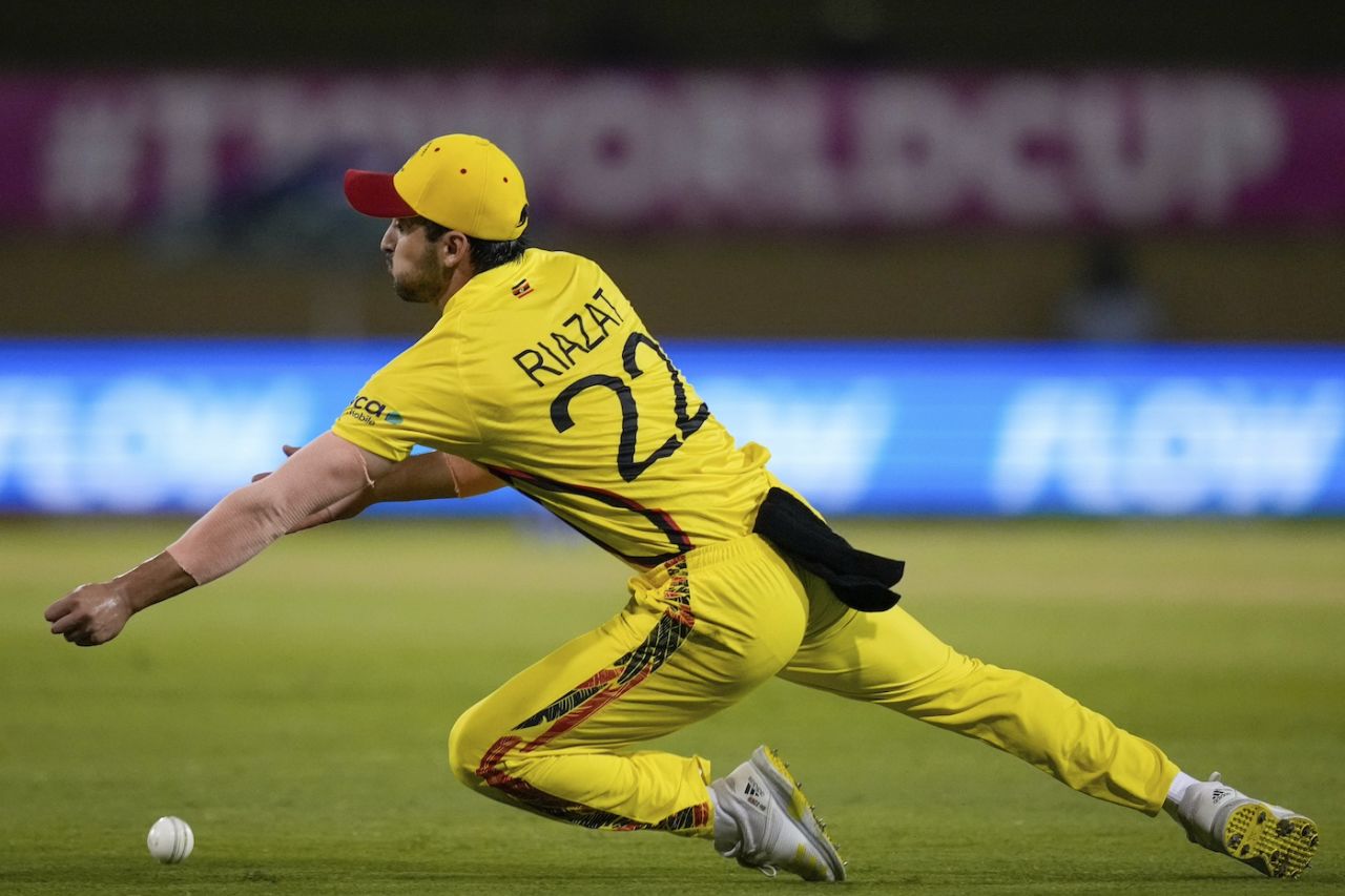 Riazat Ali Shah makes a diving effort, Afghanistan vs Uganda, T20 World Cup 2024, Providence, June 3, 2024