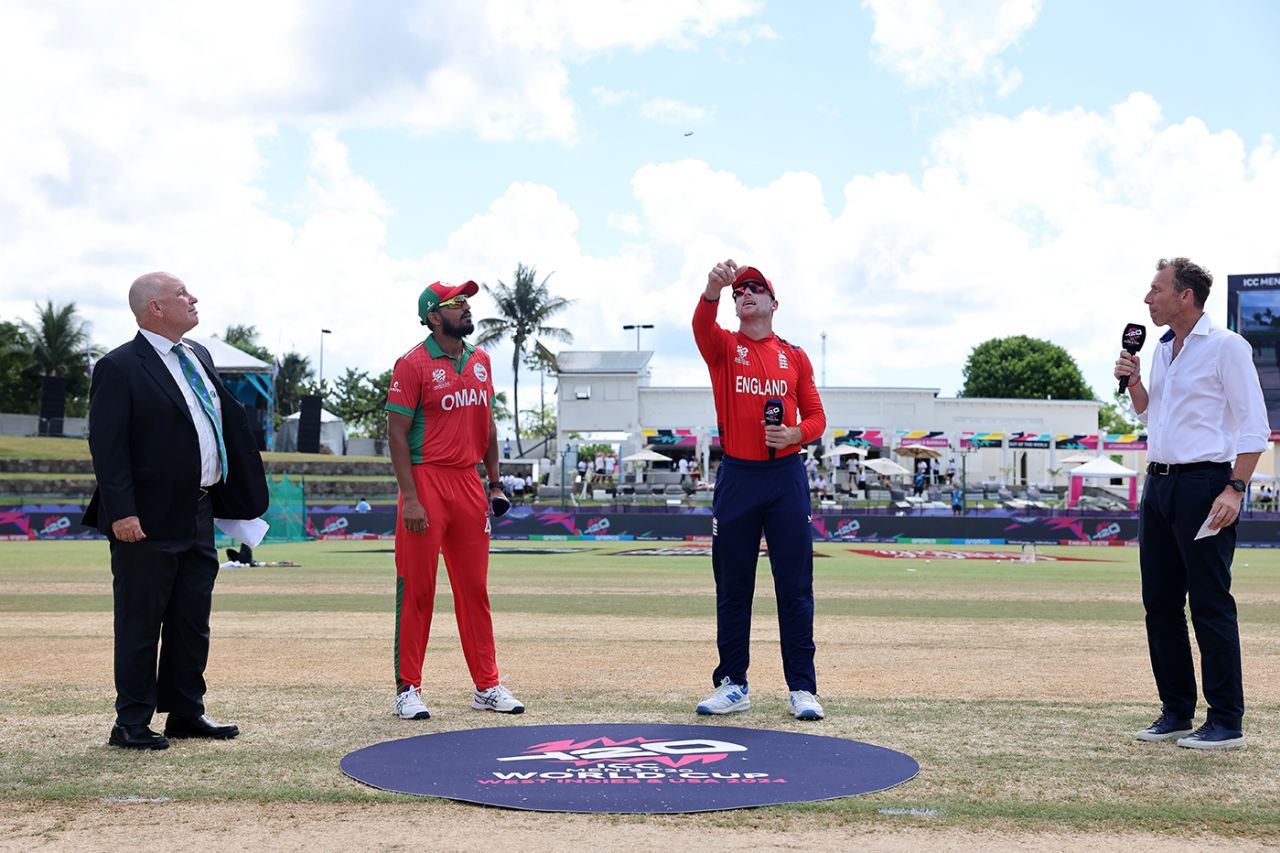 Jos Buttler tosses the coin while Aqib Ilyas looks on, England vs Oman, T20 World Cup, Group B, Antigua, June 13, 2024