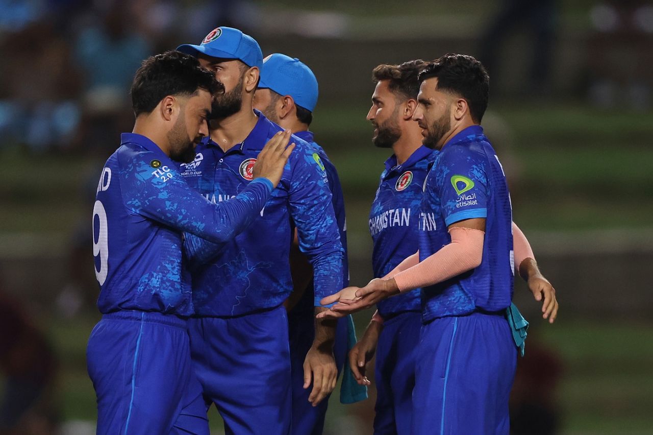 Fazalhaq Farooqi celebrates a wicket with his team-mates, Afghanistan vs PNG, T20 World Cup, Group C, Trinidad, June 13, 2024
