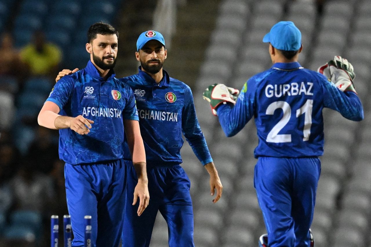 Naveen-ul-Haq celebrates a wicket with Ibrahim Zadran and Rahmanullah Gurbaz, Afghanistan vs PNG, T20 World Cup, Group C, Trinidad, June 13, 2024