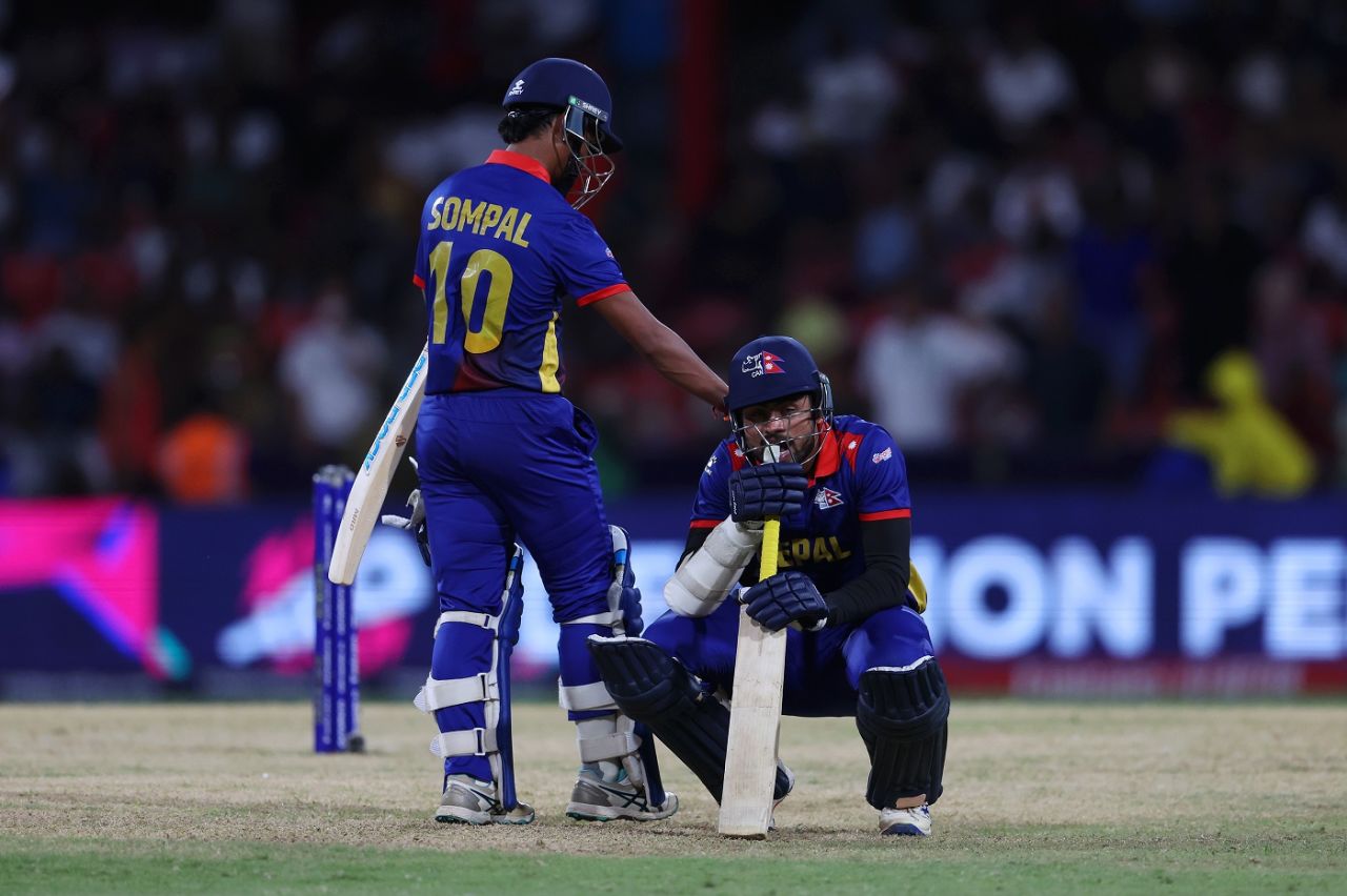 Gulsan Jha is consoled by Sompal Kami after Nepal came agonisingly close, Nepal vs South Africa, Men's T20 World Cup, Kingstown, June 14, 2024