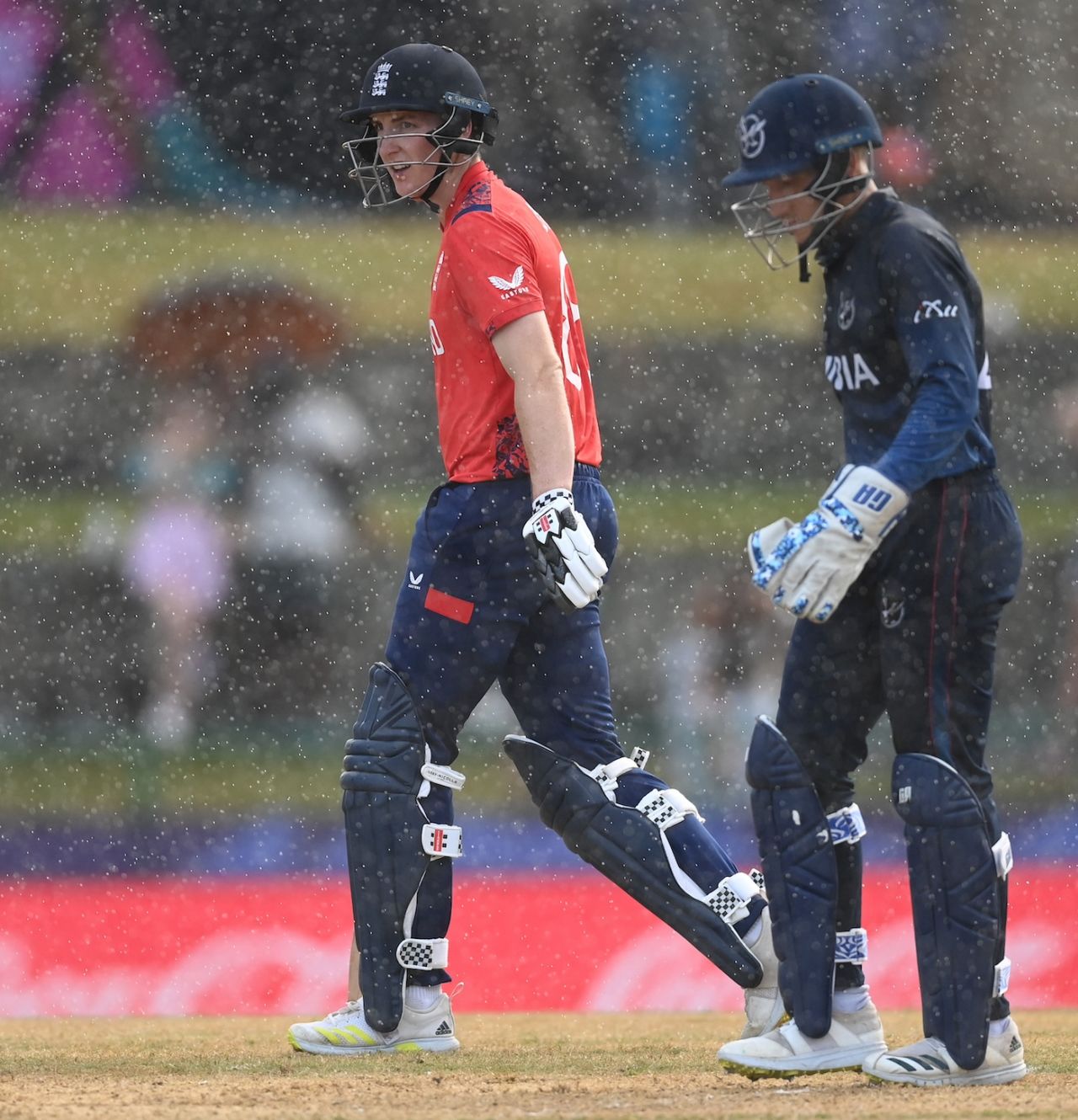 Harry Brook and Zane Green walk off as the rain returns, England vs Namibia, T20 World Cup 2024, North Sound, June 15, 2024