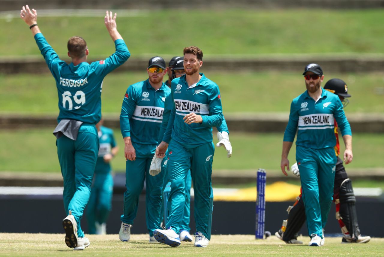 Mitchell Santner celebrates the wicket of Sese Bau with team-mates, New Zealand vs PNG, Tarouba,T20 World Cup 2024, June 17, 2024