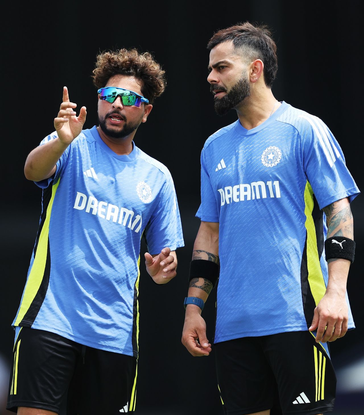 Kuldeep Yadav has a word with Virat Kohli at a training session, ICC T20 World Cup 2024, Barbados, June 18, 2024