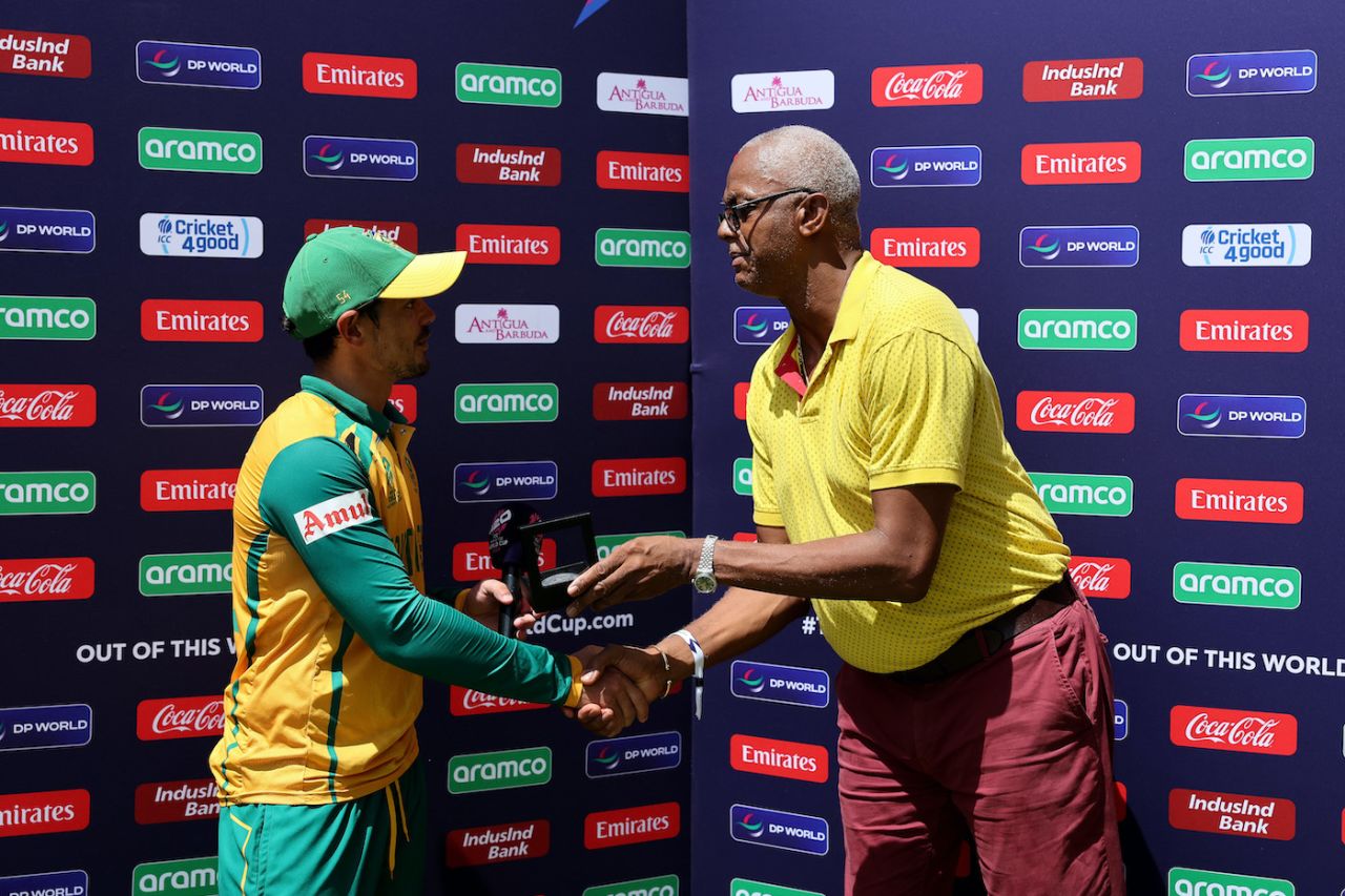 Quinton de Kock collects his player-of-the-match award from Courtney Walsh, USA vs South Africa, T20 World Cup 2024, North Sound, June 19, 2024