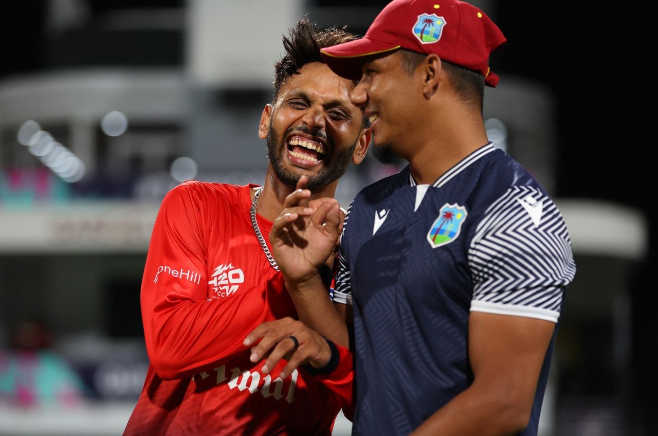 Milind Kumar and Gudakesh Motie share a light moment, West Indies vs USA, T20 World Cup 2024, Super Eight, Bridgetown, June 21, 2024