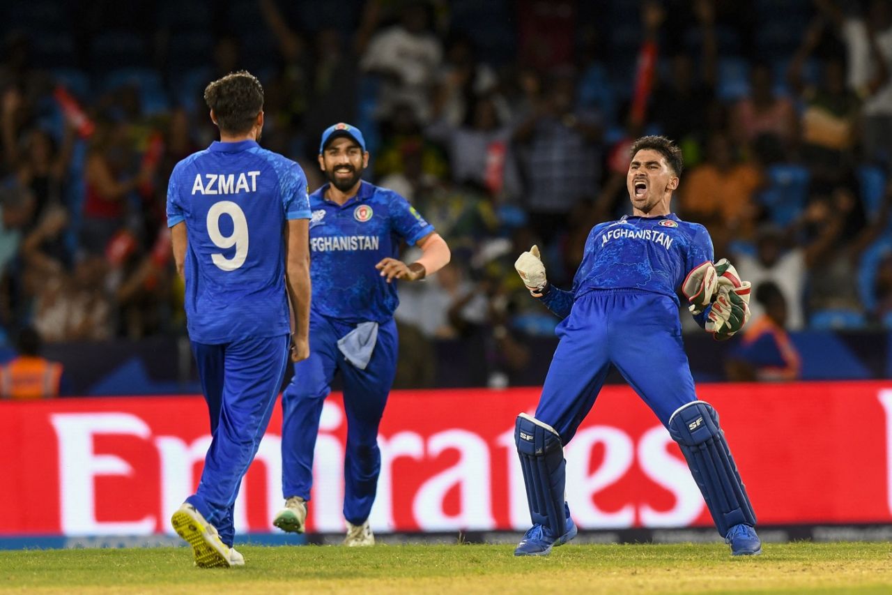 Rahmanullah Gurbaz celebrates that winning feeling with Azmatullah Omarzai, Afghanistan vs Australia, T20 World Cup, Super Eight, Group 1, Kingstown, June 22, 2024