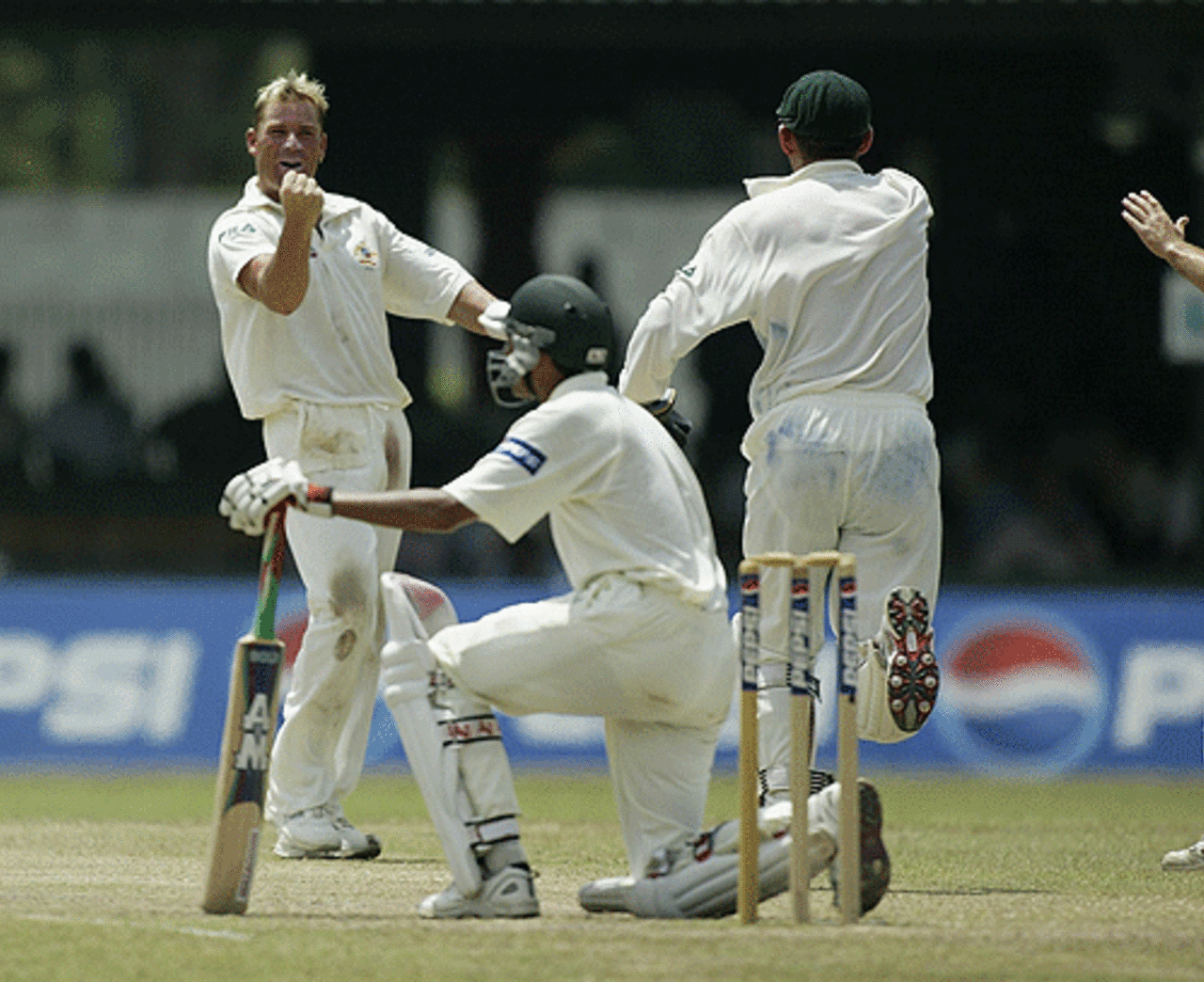 COLOMBO - OCTOBER 7: Shane Warne of Australia celebrates dismissing Younis Khan of Pakistan during the fifth day of the first test match between Pakistan and Australia at the P.Saravanamuttu Stadium in Colombo, Sri Lanka on October 7, 2002.