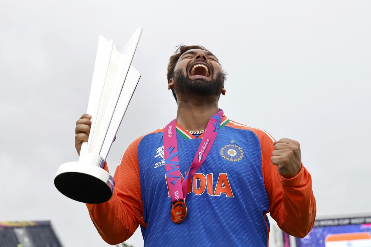 Rishabh Pant poses with the trophy