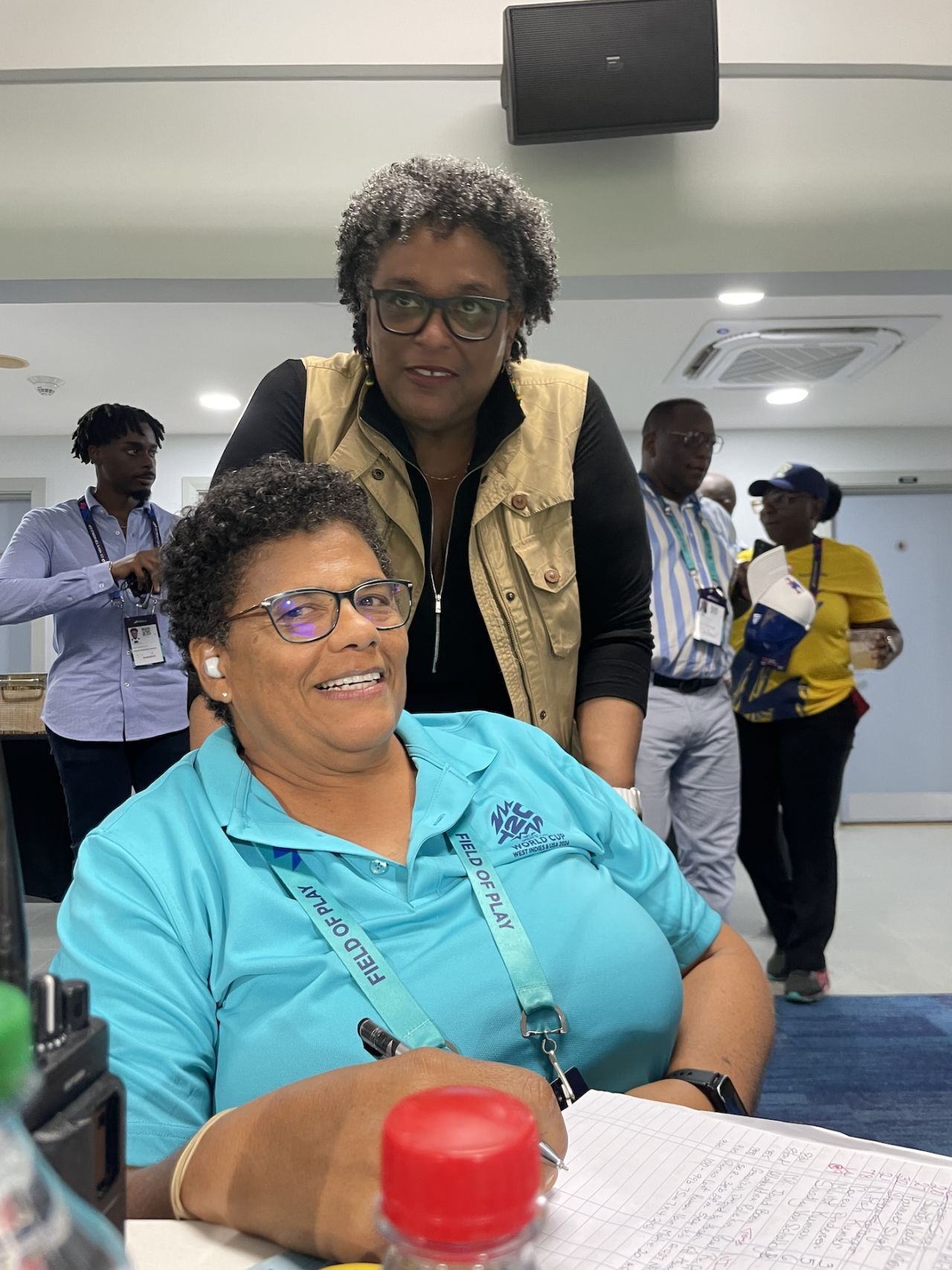 Mia Mottley, the prime minister of Barbados (top), and Suzanne Belle, the press scorer at Kensington Oval Bridgetown, Barbados, June 21, 2024