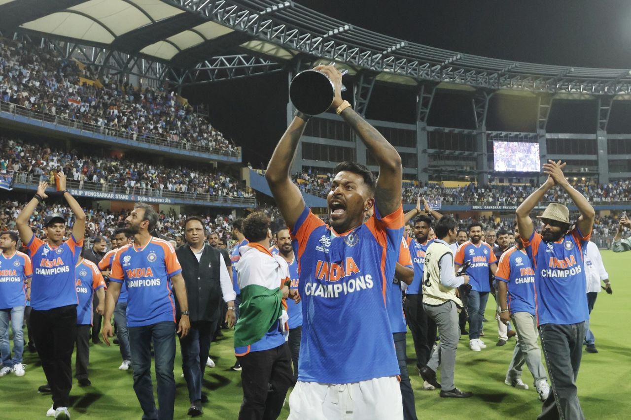 Hardik Pandya holds up the T20 World Cup trophy, Mumbai, July 4, 2024