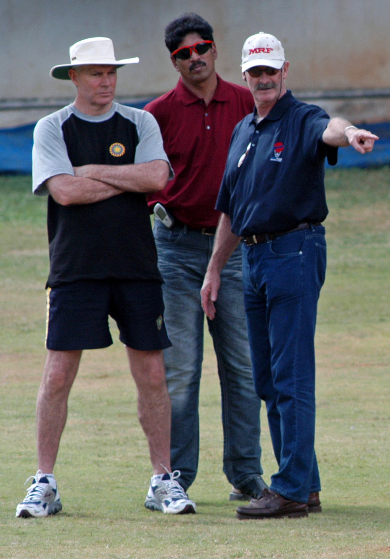 Greg Chappell, TA Sekhar and Dennis Lillee in a discussion during a fast bowlers' conditioning camp in Bangalore, July 2, 2005