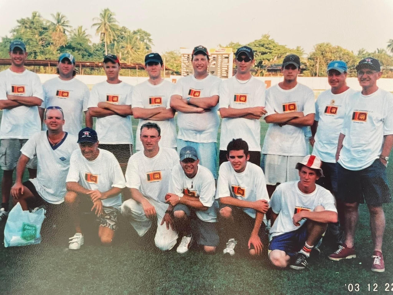 Andy Clark (third from left, front row) and Andrew Miller (fourth from left, back row) sporting Corridor of Uncertainty T-shirts during a match against a Sri Lanka Veterans XI in Colombo in 2003