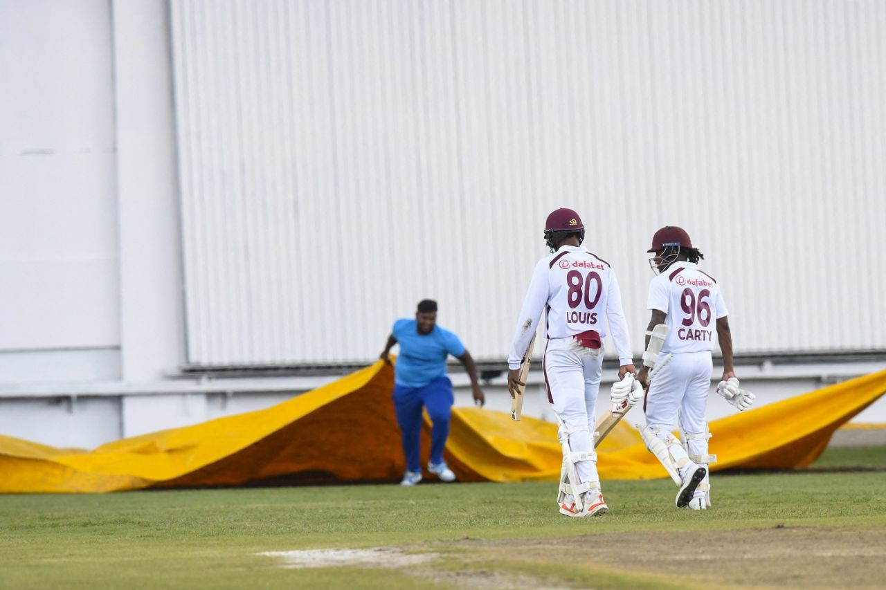 Mikyle Louis and Keacy Carty walk off the field as rain arrives, West Indies vs South Africa, 1st Test, Port-of-Spain, day 5, August 11, 2024