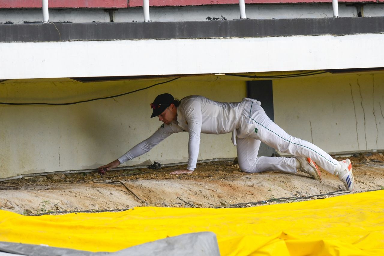 Tristan Stubbs retrieves the ball from under the stands, West Indies vs South Africa, 1st Test, Port-of-Spain, day 5, August 11, 2024