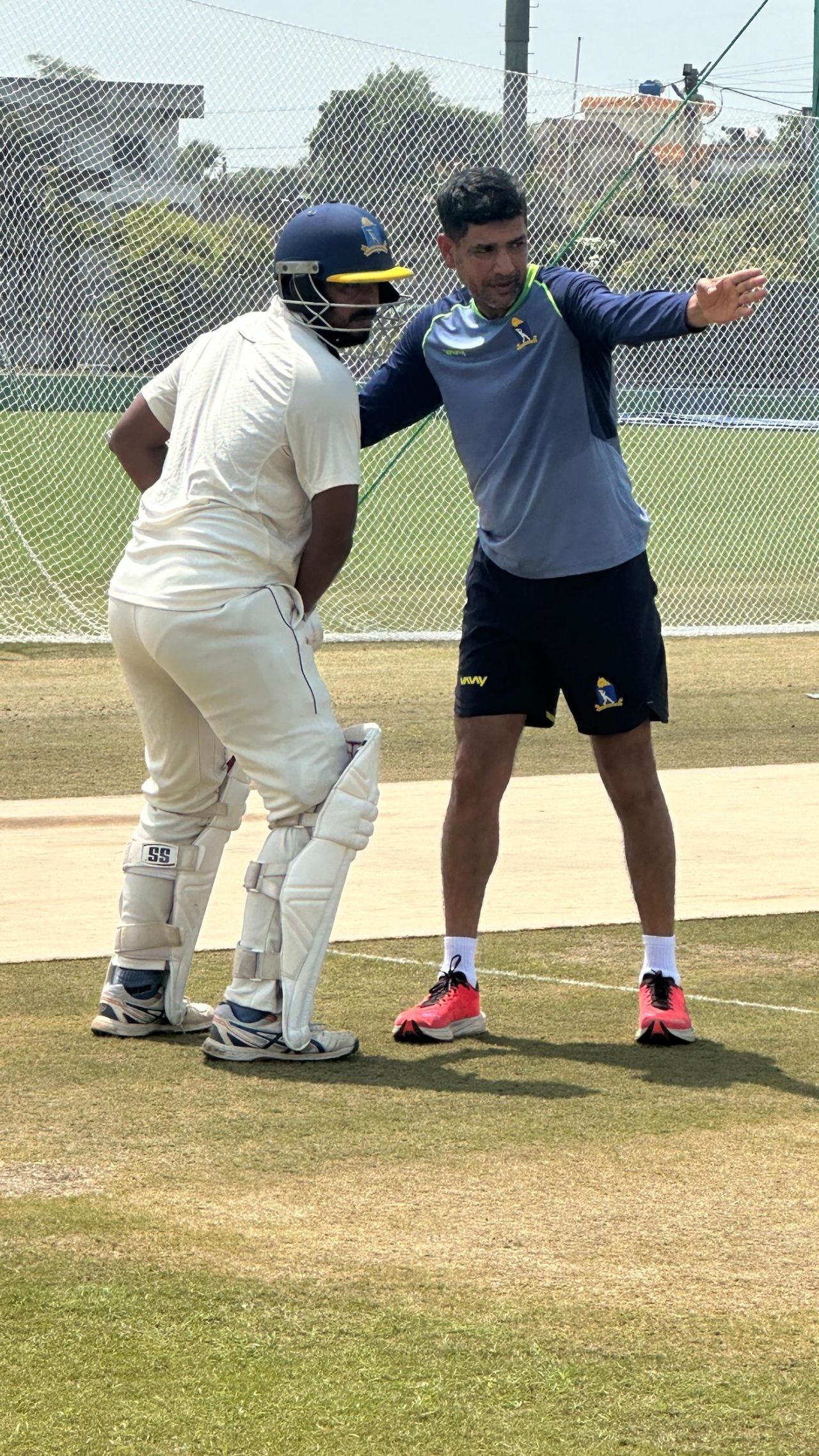 Laxmi Ratan Shukla helps out Shreyansh Ghosh in the nets, August 16, 2024