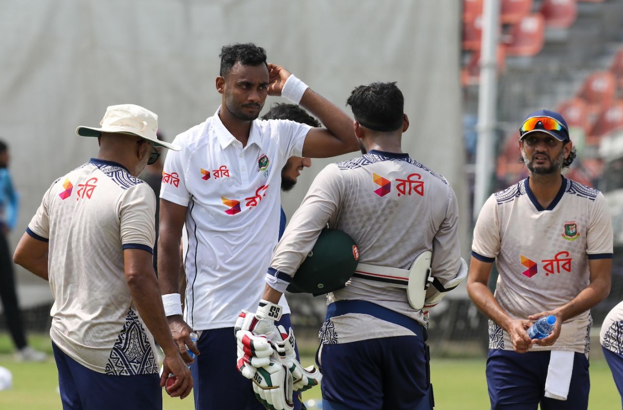 Shoriful Islam chats with his colleagues during a training session, Lahore, August 16, 2024