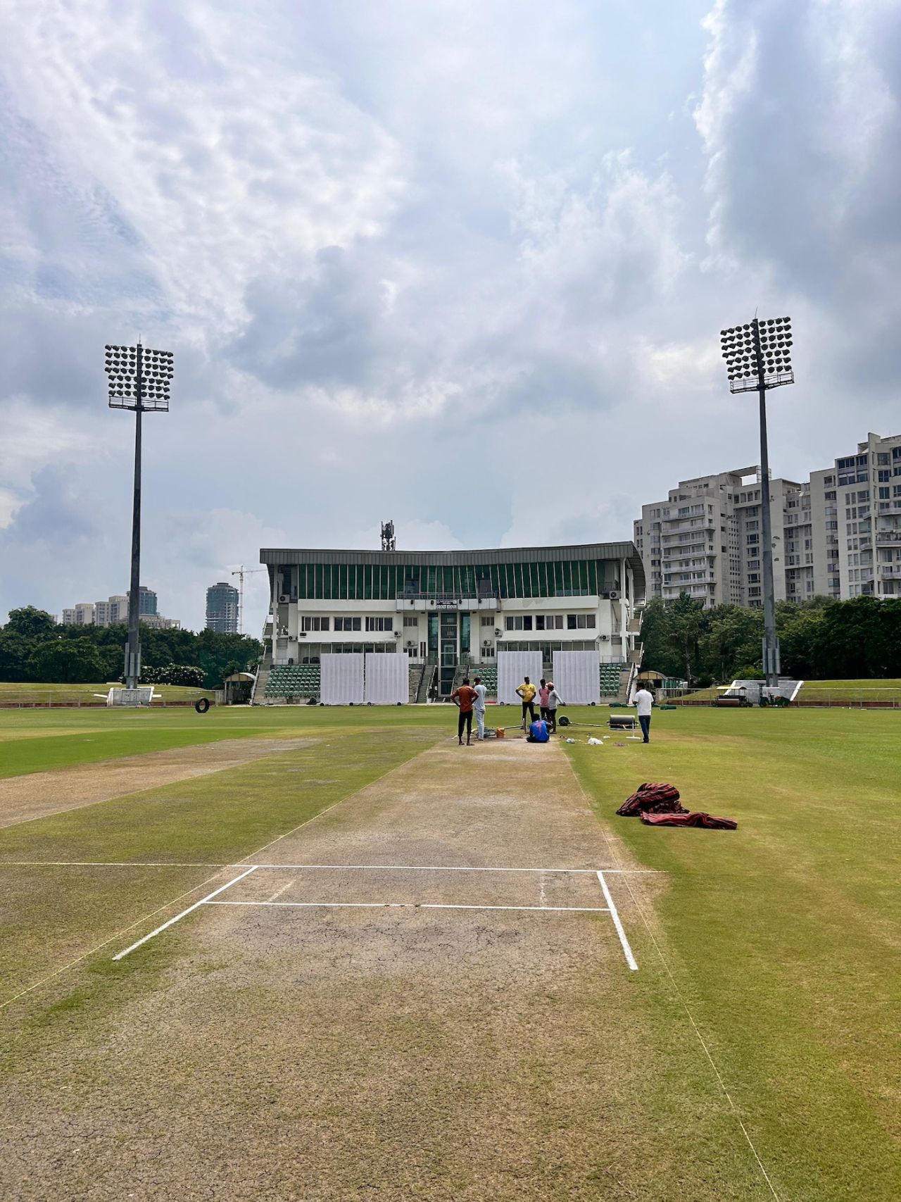 Groundspersons at work to get the Greater Noida pitch Test-ready, Greater Noida, August 30, 2024