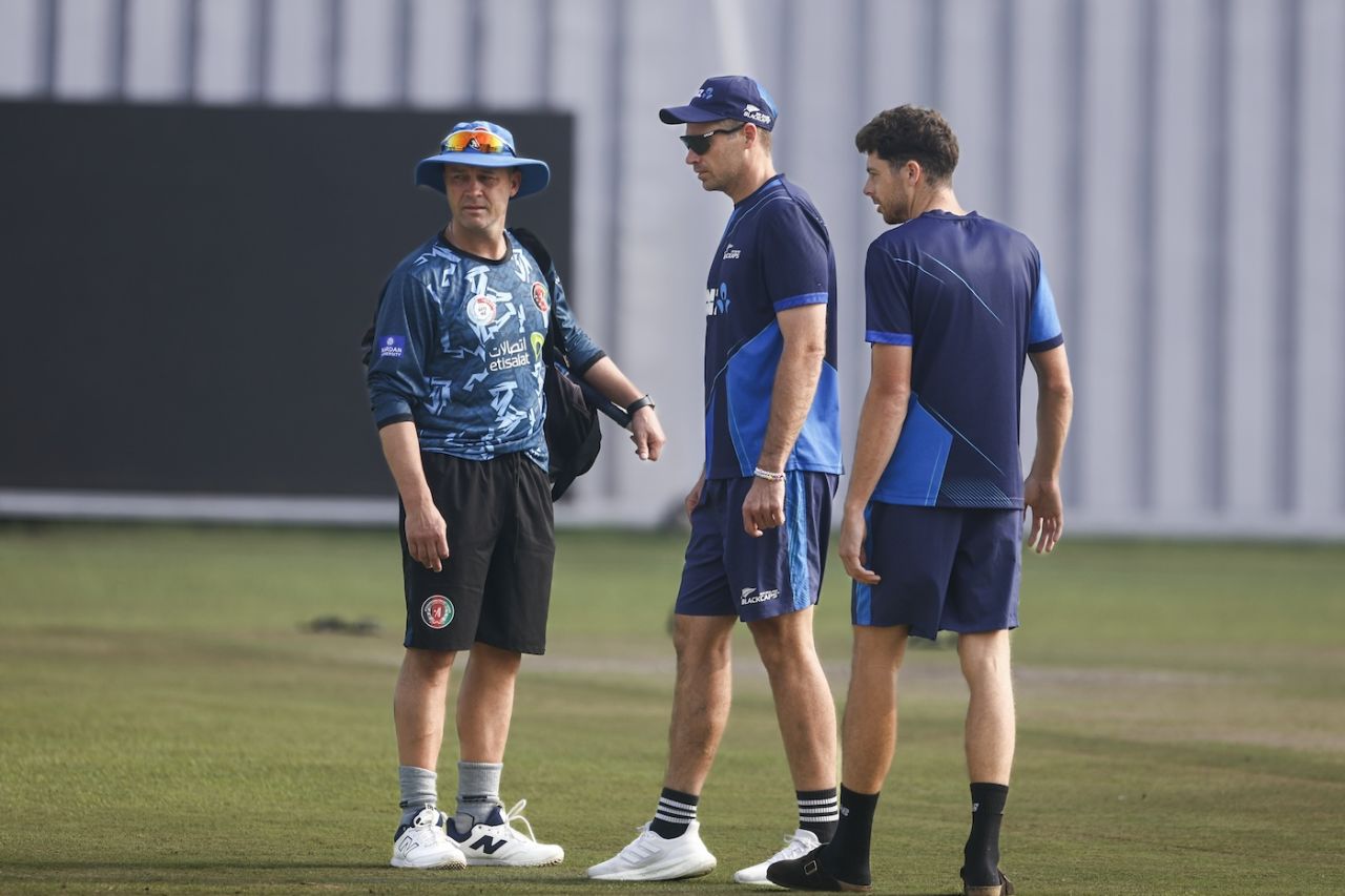Afghanistan coach Jonathan Trott checks the ground with Tim Southee and Mitchell Santner, Afghanistan vs New Zealand, Only Test, 1st day, Greater Noida, September 9, 2024