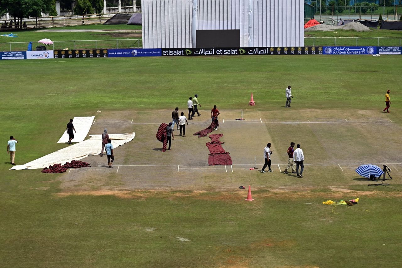 The ground staff work around the pitch and the outfield, Afghanistan vs New Zealand, Only Test, 2nd day, Greater Noida, September 10, 2024