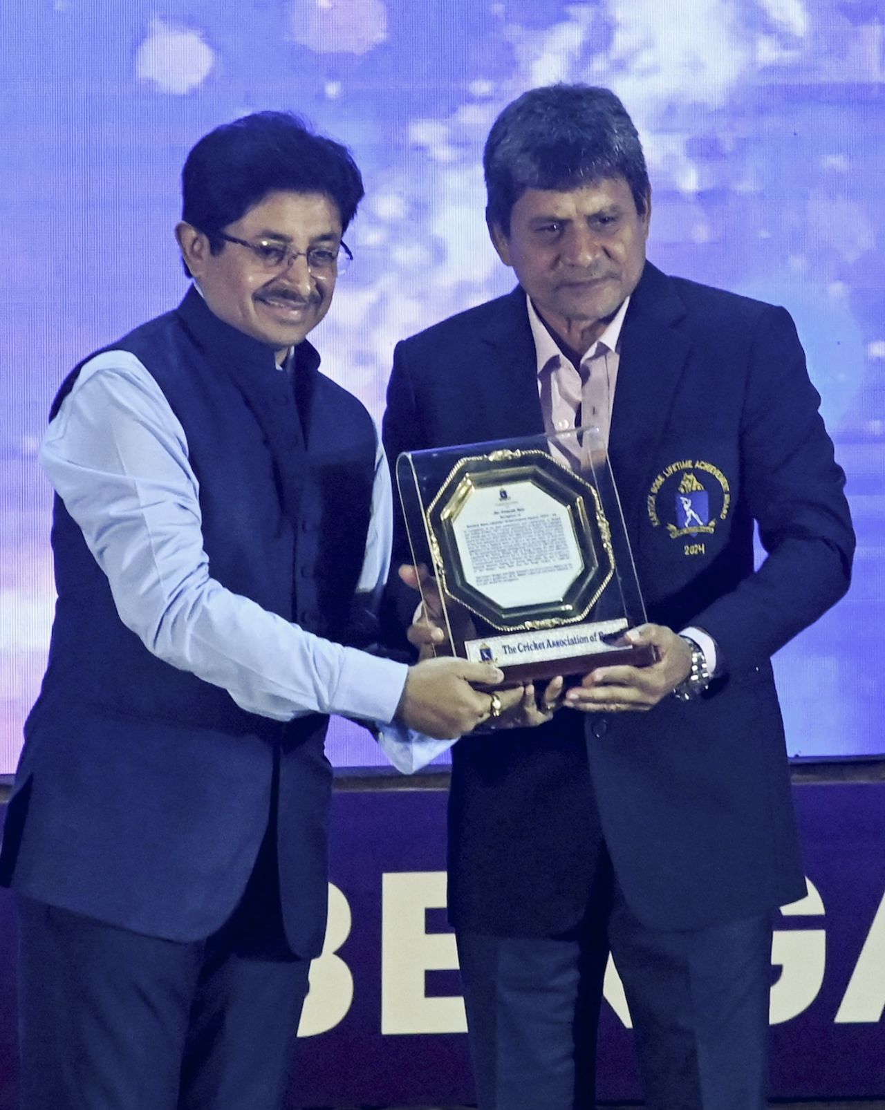 CAB president Snehasish Ganguly presents the lifetime achievement award to Pranab Roy, Kolkata, September 14, 2024