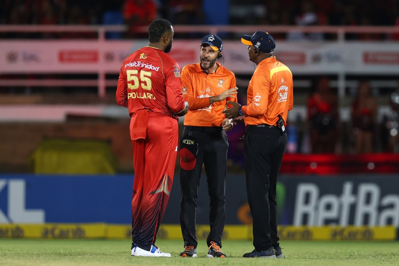 Kieron Pollard has a word with umpires Christopher Taylor and Patrick Gustard after confusion regarding Imad Wasim's potential dismissal, Trinbago Knight Riders vs Antigua And Barbuda Falcons, CPL 2024, Port of Spain, September 19, 2024