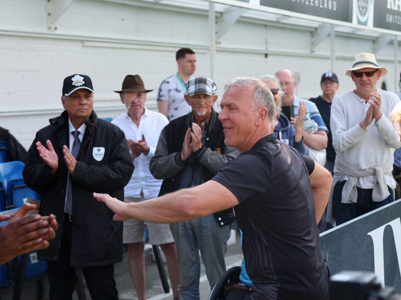 Alec Stewart celebrates with Surrey fans after their victory over Durham, Surrey vs Durham, County Championship, The Oval, September 19, 2024