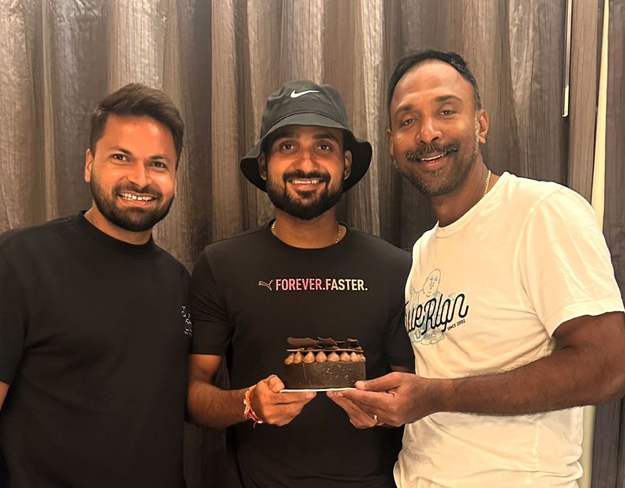 Mukesh Kumar and Akash Deep bring Saurasish Lahiri a birthday cake, Bengaluru, September 8, 2024