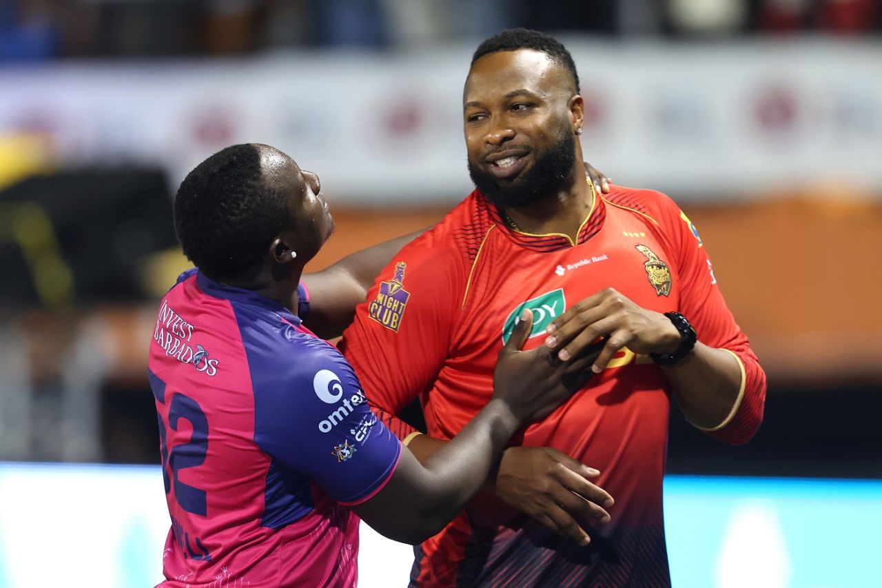 Rovman Powell and Kieron Pollard share a lighter moment, Trinbago Knight Riders vs Barbados Royals, Eliminator, CPL 2024, October 1, 2024
